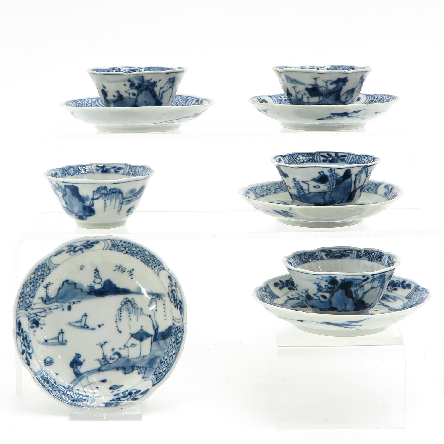 A Set of 5 Cups and Saucers
