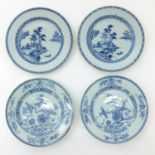 A Collection of Four Blue and White Plates