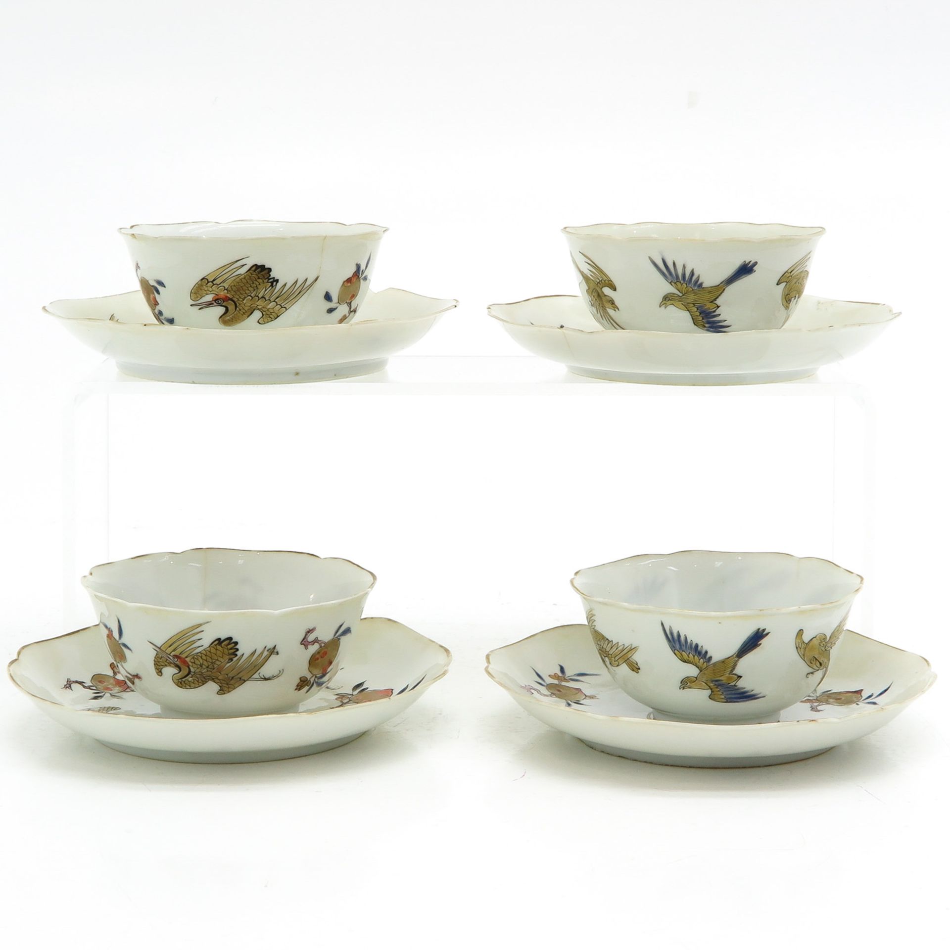 A Series of 4 Cups and Saucers