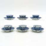 Six Blue and White Cups and Saucers