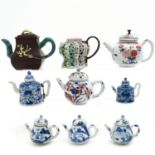 A Collection of 9 Teapots