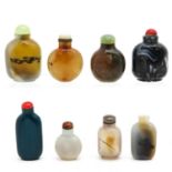 A Collection of 8 Snuff Bottles