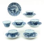 Six Blue and White Cups and Saucers