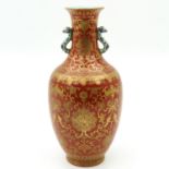 A Orange and Gilt Vase