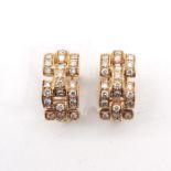 A Pair of 18KG Diamond Earrings