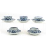 Five Blue and White Cups and Saucers