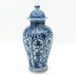 A BLue and White Vase with Cover