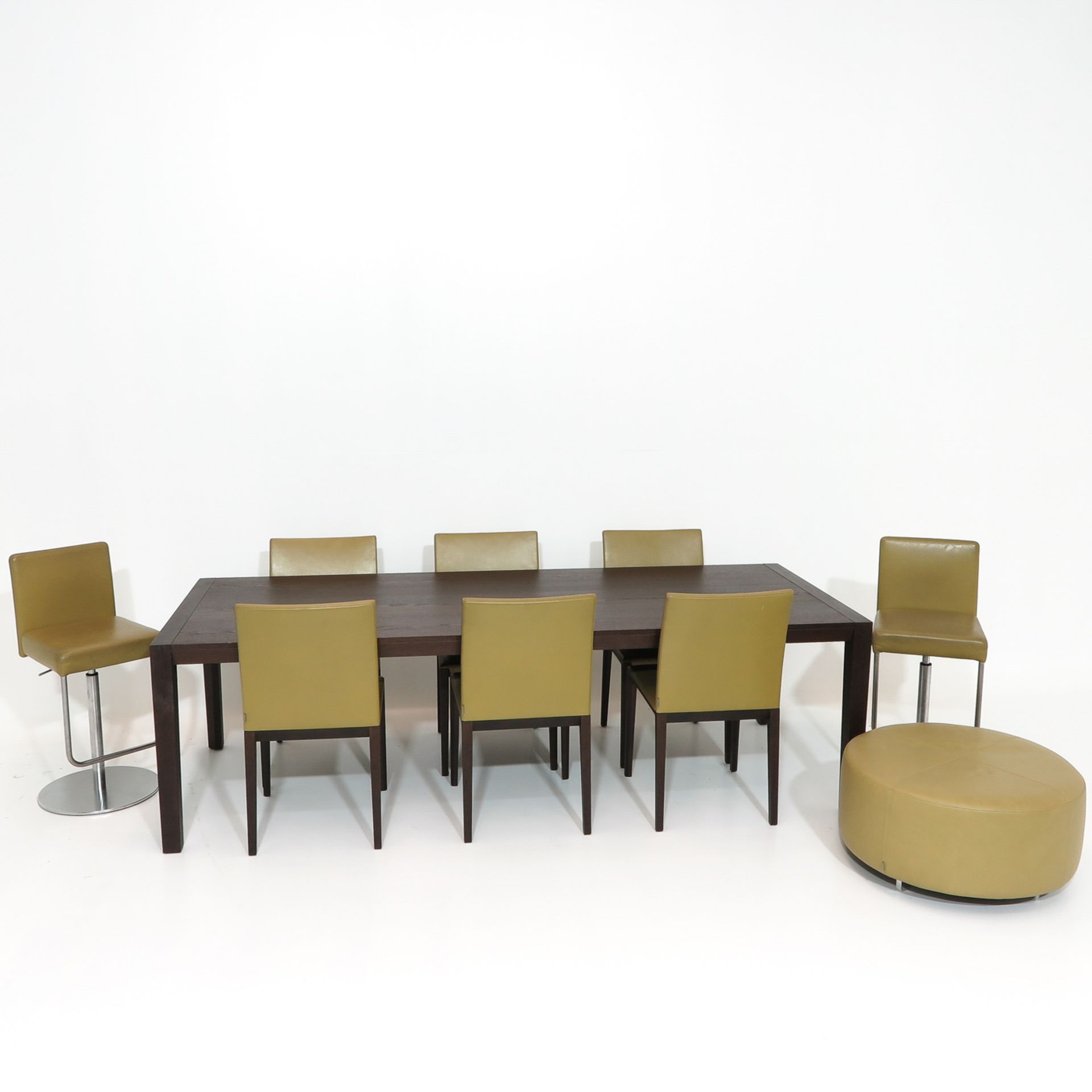 A Walter Knoll Design Table with Chairs and Barstools