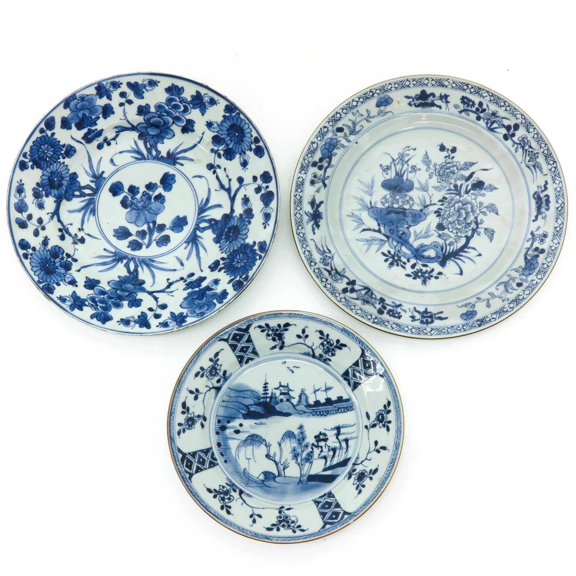 Three Blue and White Plates