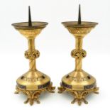 A Pair of Bronze and Enamel Church Candlesticks