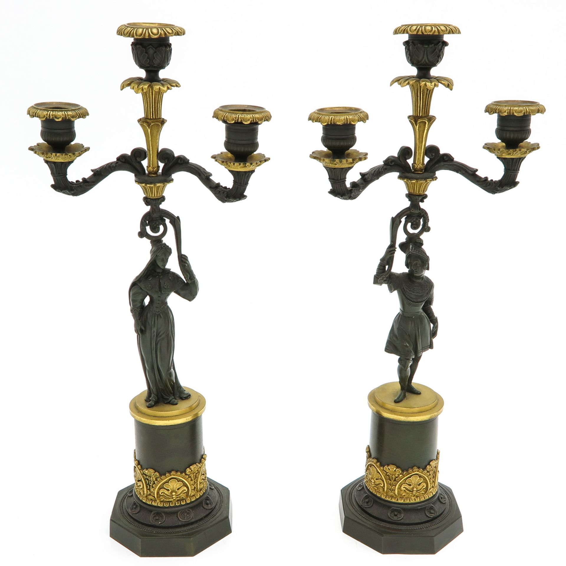 A Pair of 19th Century Empire Candelsticks