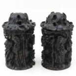 A Pair of Carved Wood Vases with Cover