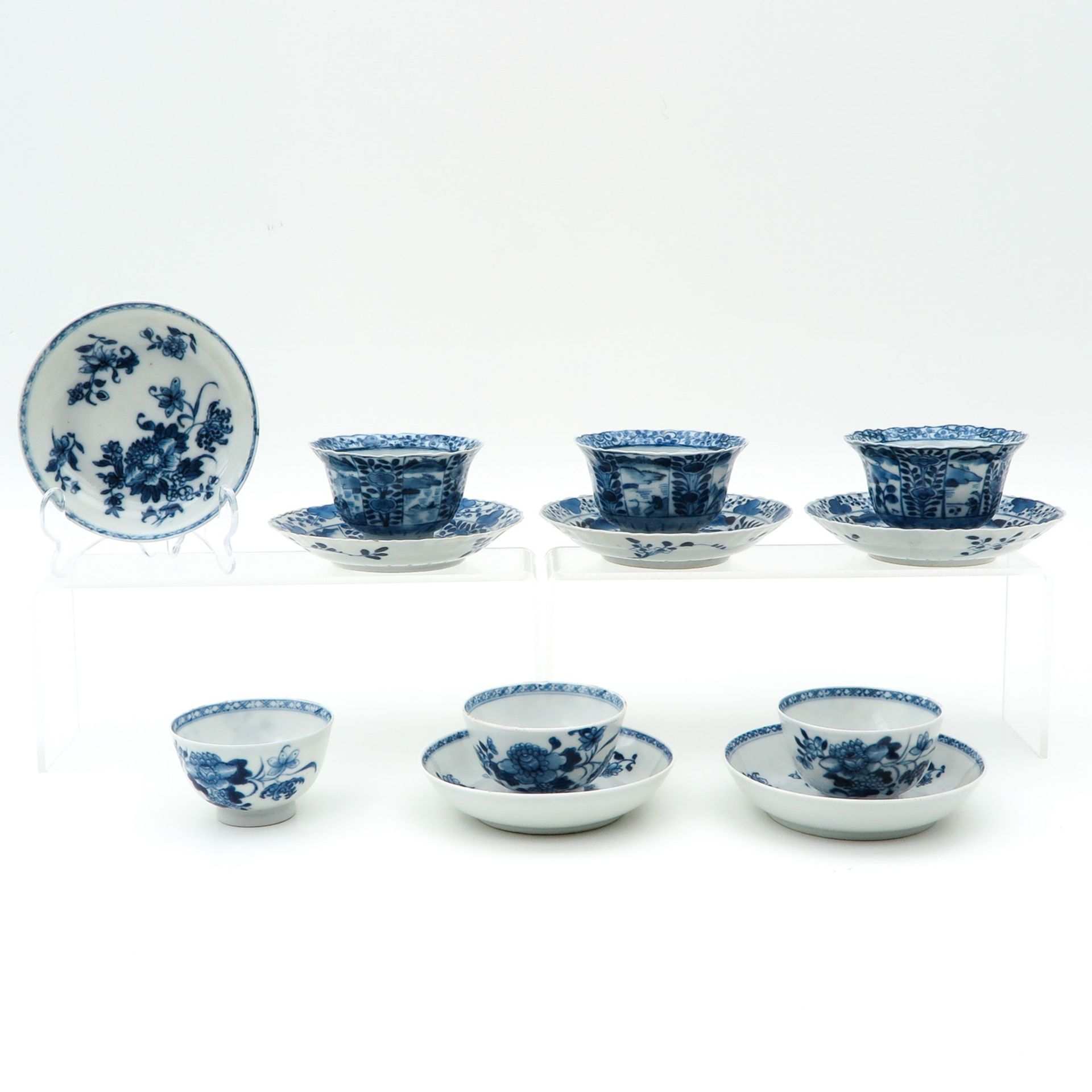 A Collection of Six Cups and Saucers