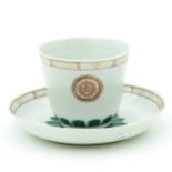 A Polychrome Cup and Saucer