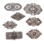 A Collection of Seven Silver Apron Clasps