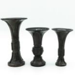 A Set of Three Bronze Gu Vases