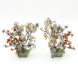 A Pair of Jade Floral Sculptures