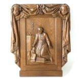 A Carved Oak Religious Panel