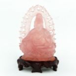 A Carved Pink Quartz Buddha Sculpture