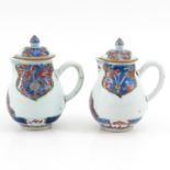 Two Polychrome Small Chocolate Pots