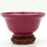 A Ruby Glaze Bowl on Wood Base