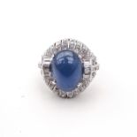 A Ladies 14KG Diamond and Star Sapphire Ring