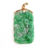 A Carved Jade Pendant