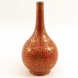An Orange and Gilt Bottle Vase