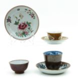 A Collection of Batavianware Cups and Saucers