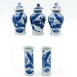 A Set of Five Miniature Garniture Vases