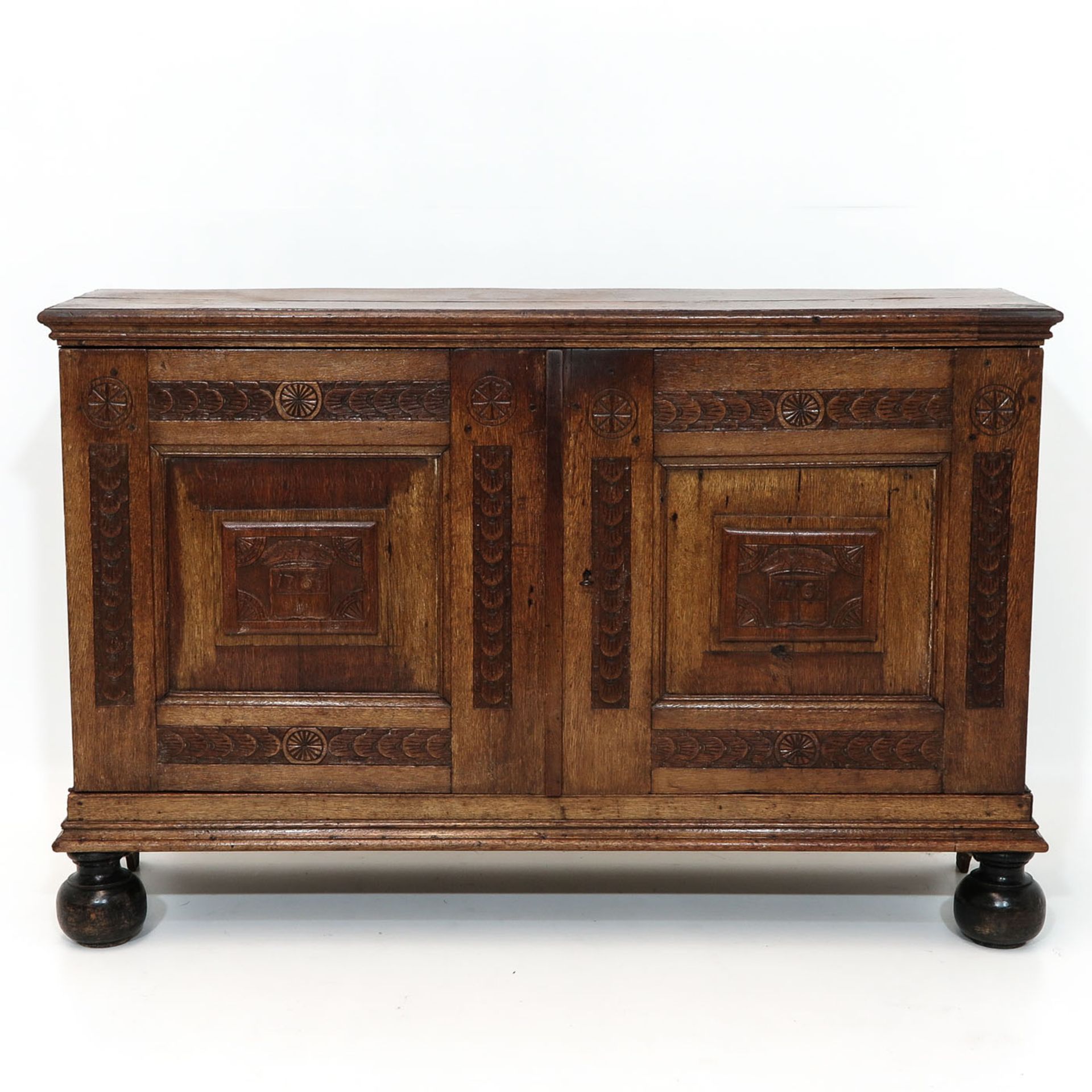 A Carved Oak Sideboard