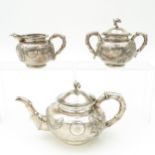 A Three Piece Chinese Silver Tea Service