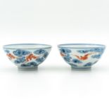 A Pair of Iron Red and Blue Bowls