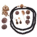 A Collection of Garnet Jewelry