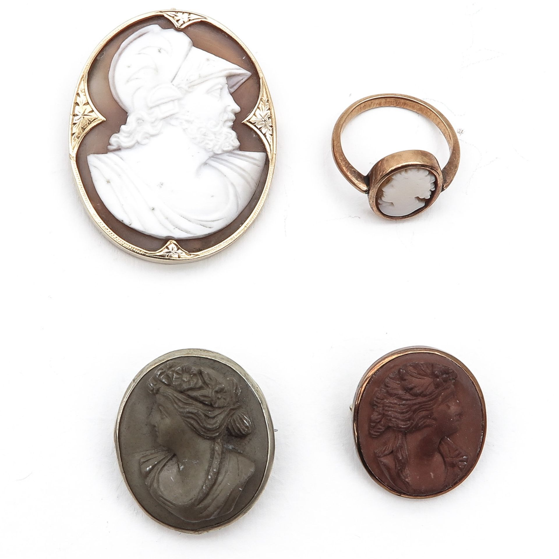 A Collection of Shell and Lava Cameo Jewelry
