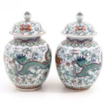 A Pair of Jars with Covers