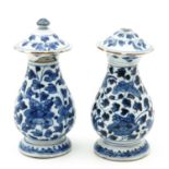 A Pair of Blue and White Covered Vases