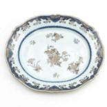 A Blue and Gilt Serving Tray