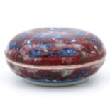 A Red and Blue Round Dragon Box