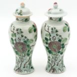 A Pair of Vases with Covers