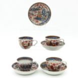 A Set of 4 Imari Cup sand Saucers