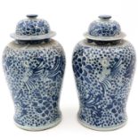 A Pair of Blue and White Jars with Covers