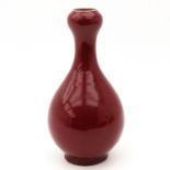 A Sang de Boeuf Garlic Neck Vase