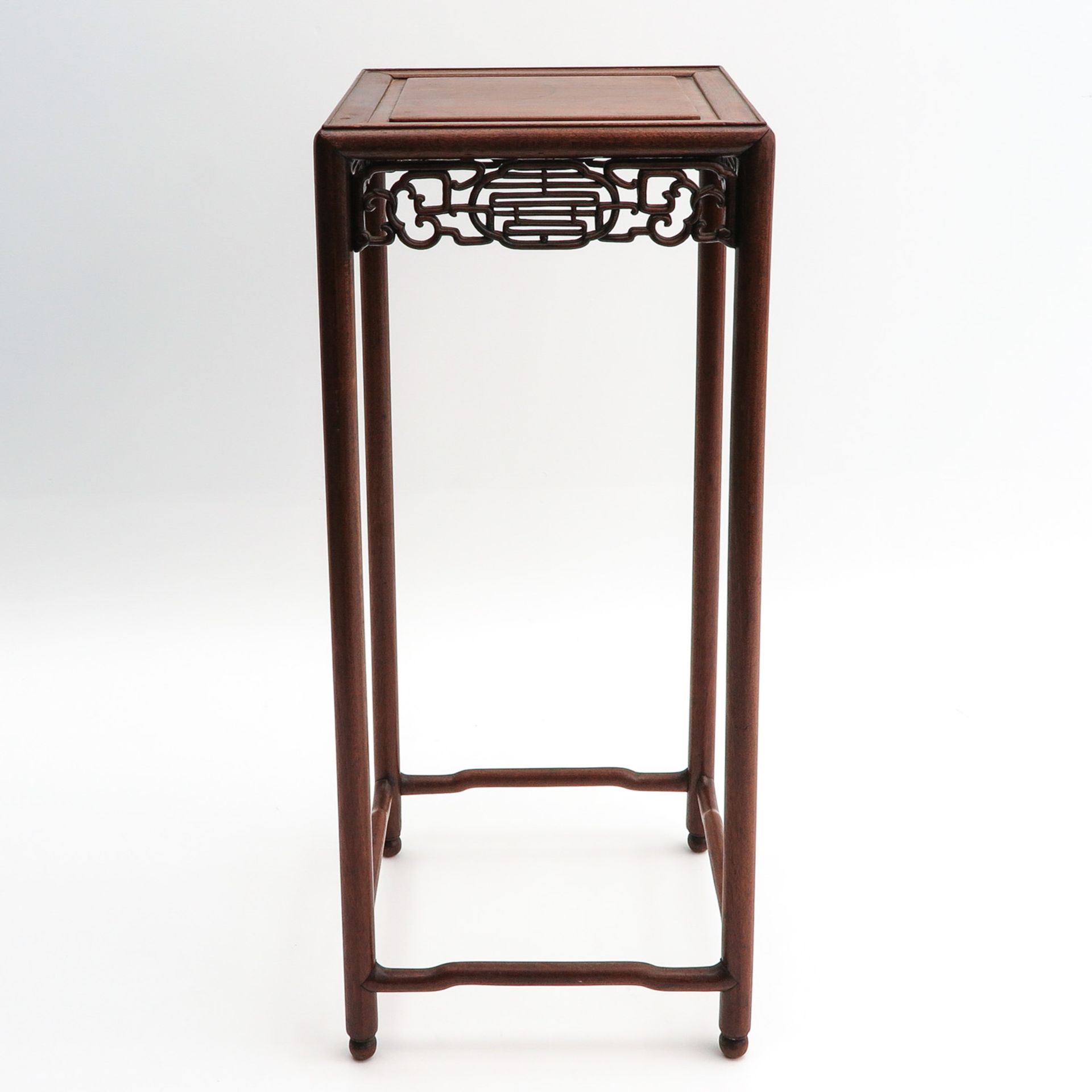 A Carved Wood Side Table