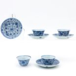 4 Blue and White Cups and Saucers