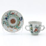 A Polychrome Cup and Saucer