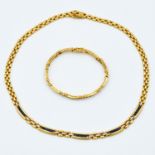 An 18KG Necklace and Bracelet