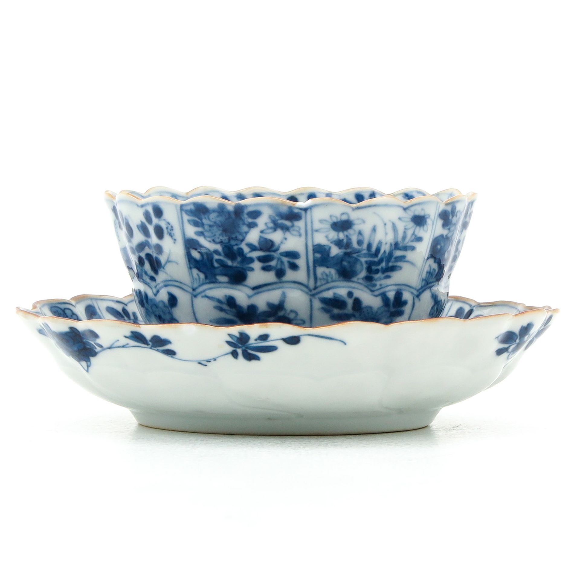 A Blue and White Cup and Saucer - Image 3 of 10