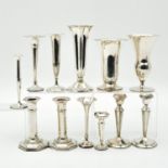 A Collection of Vases and Candlesticks