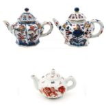 A Collection of Three Teapots